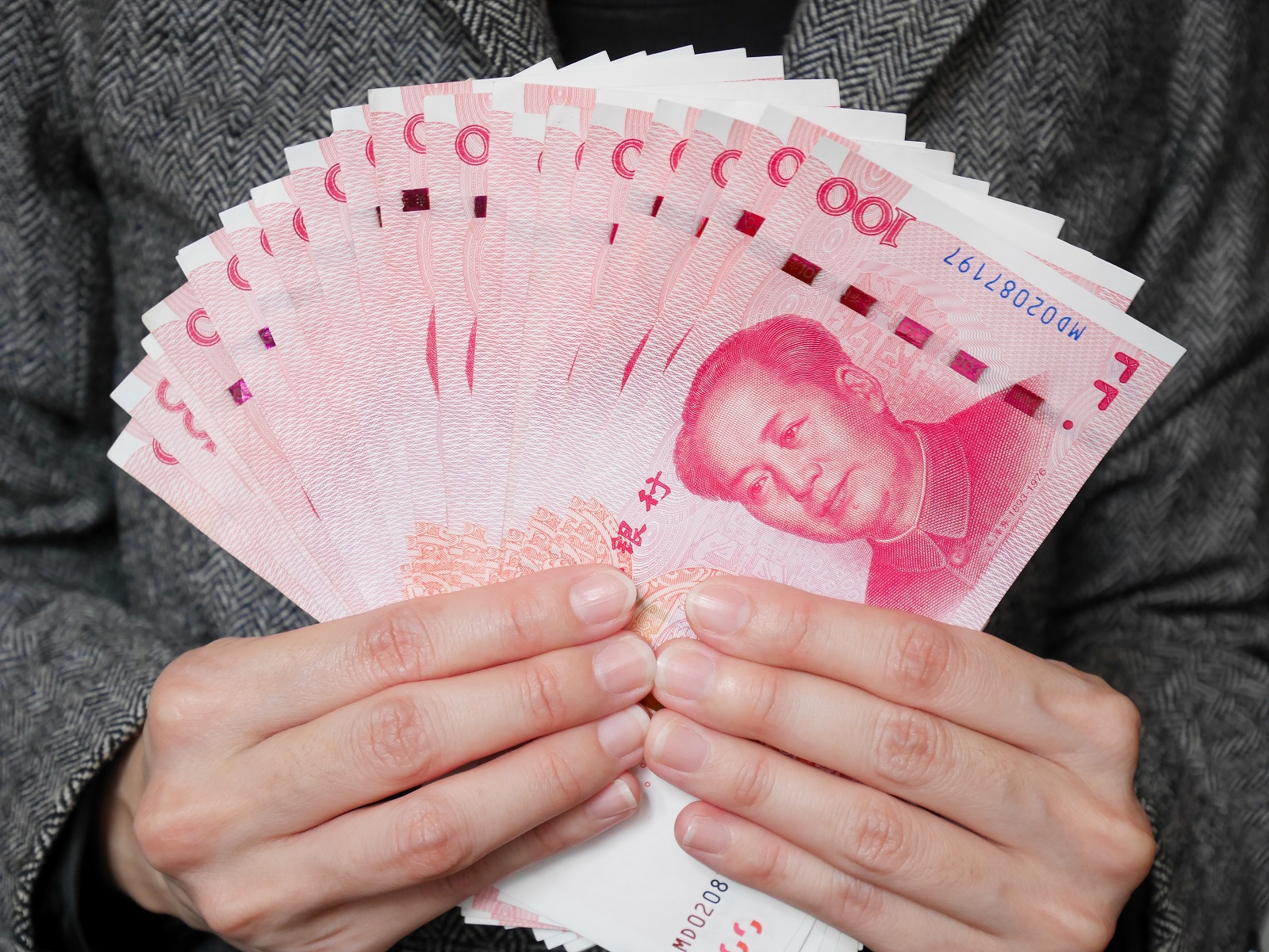 Central Bank of China Pumps 300 Billion Yuan Into Financial System, Cuts Loan Rates