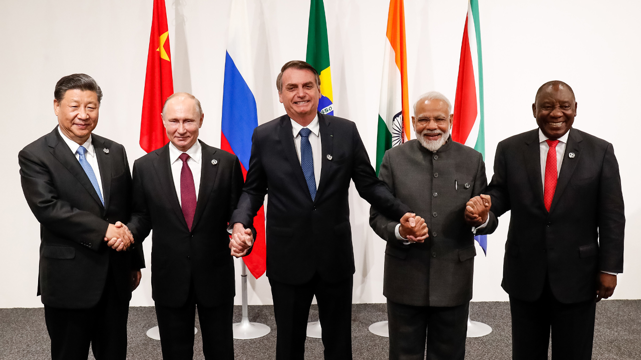 Targeting the US Dollar's Hegemony: Russia, China, and BRICS Nations Plan to Craft a New International Reserve Currency