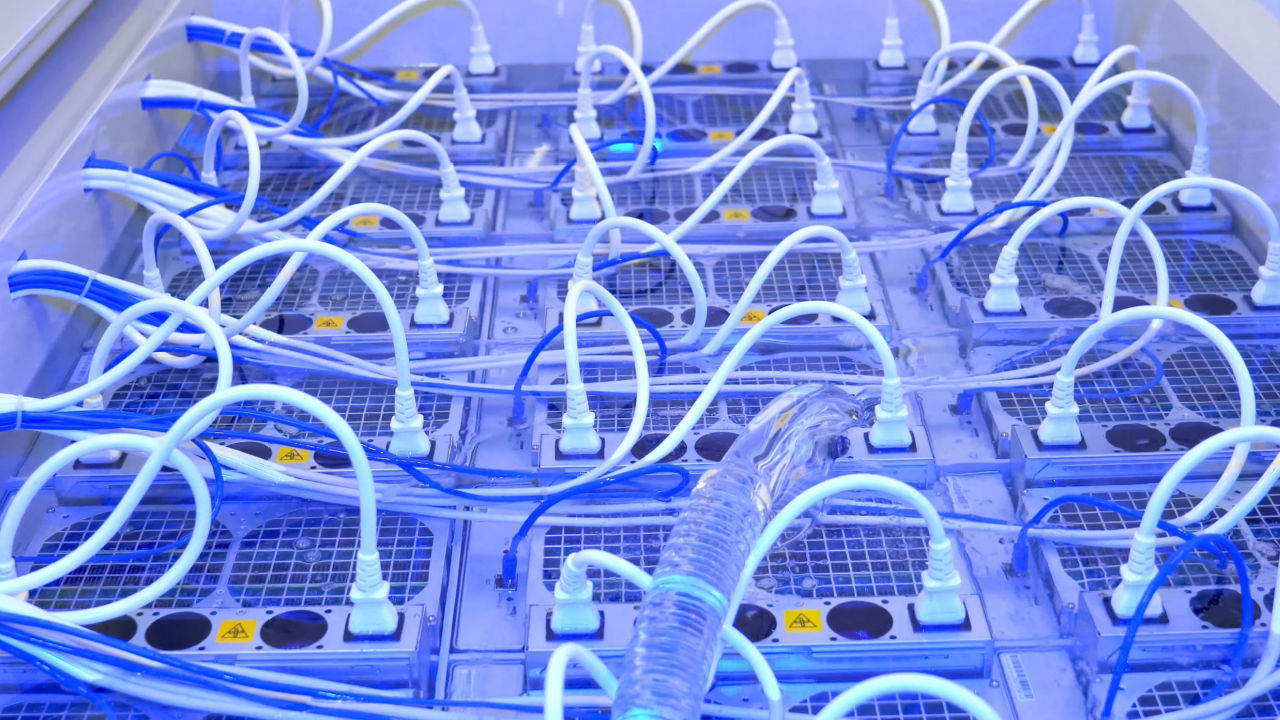 Large Immersion Cooled Crypto Mining Farms To Extract Bitcoin In Middle 