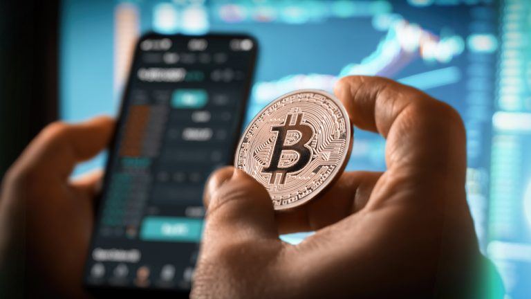 Bitcoin Climbs Above K as Trade Volume Surges